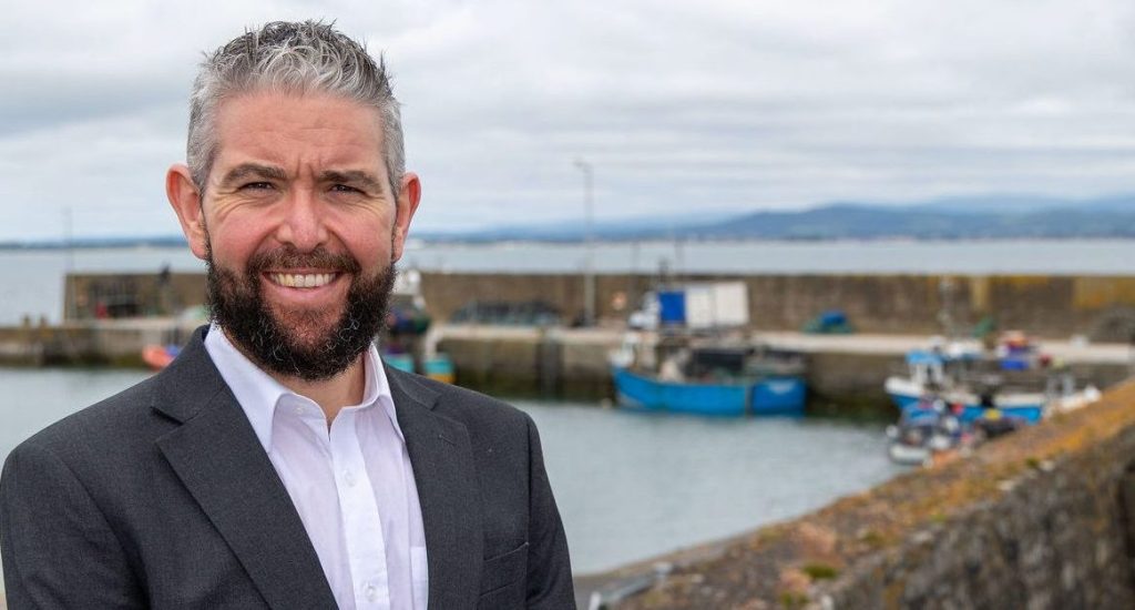 Sinn Féin TD for Waterford, Conor D. McGuinness at Cé Heilbhic in the West Waterford Gaeltacht